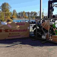 Kawasaki Motorcycle Being Unloaded at S2S Motorsports